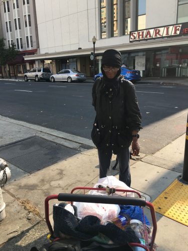 An image of a homeless woman