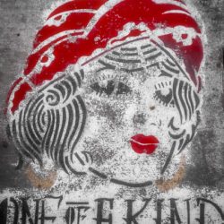 A sidewalk chalk art piece of a woman